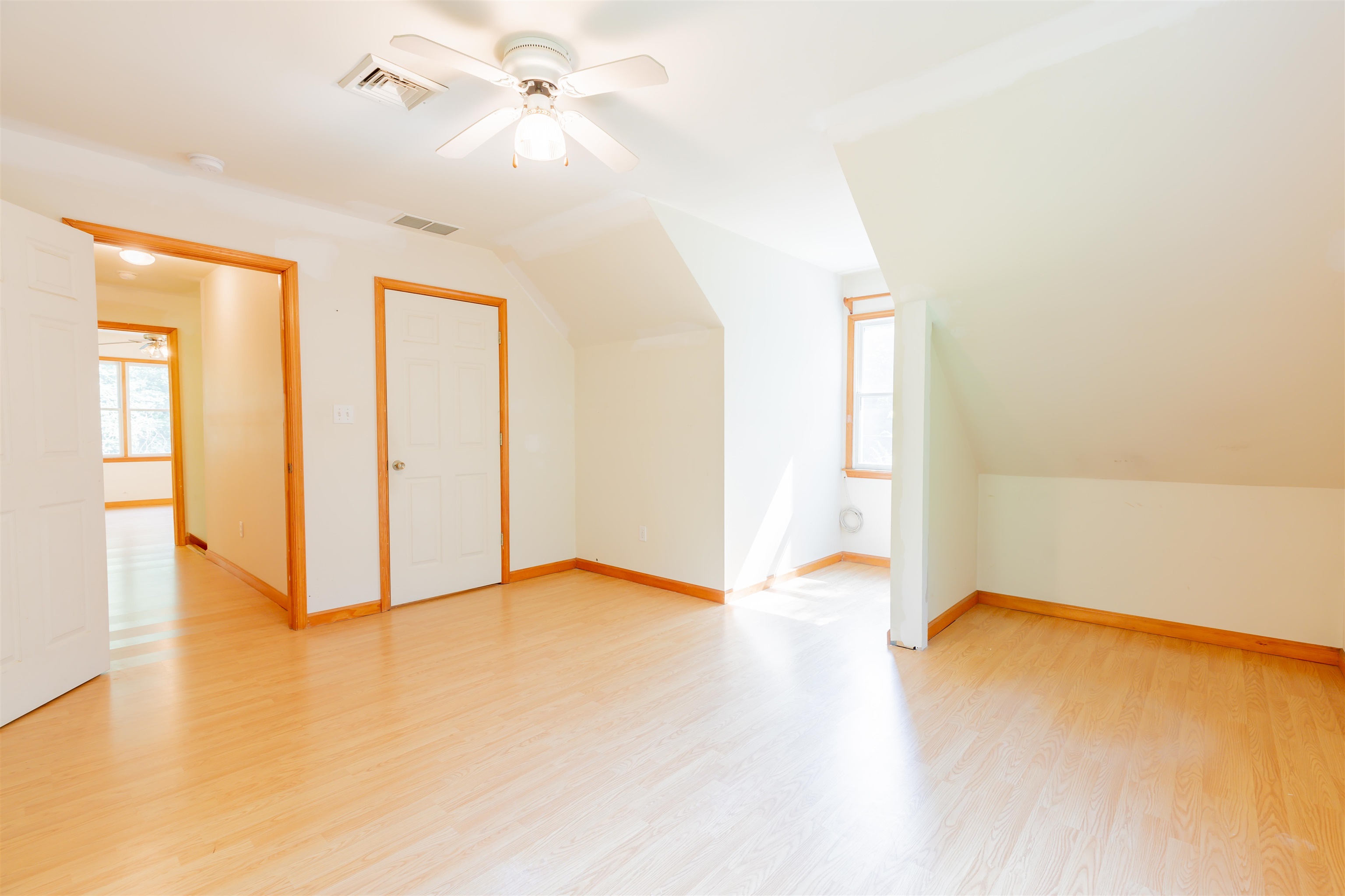 837 Weeks Landing Road Cape May, NJ 08204 - Photo 29 of 38 a view of an empty room with window and wooden floor