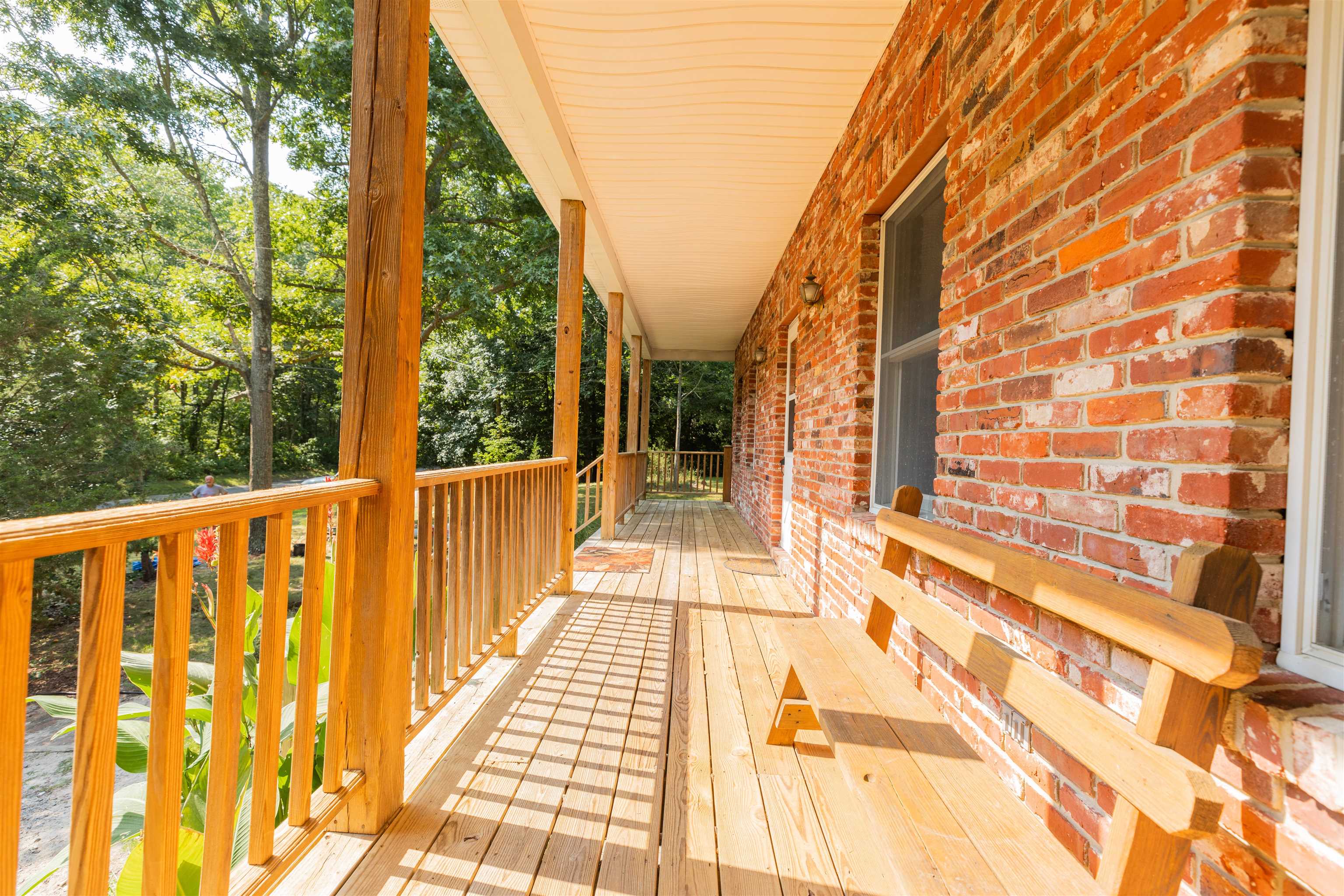 837 Weeks Landing Road Cape May, NJ 08204 - Photo 4 of 38 a view of a balcony with wooden floor and fence