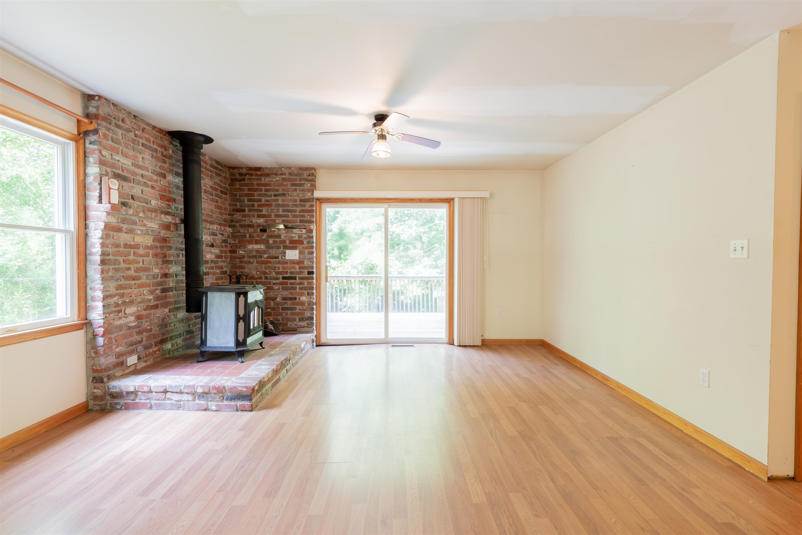 837 Weeks Landing Road Cape May, NJ 08204 - Photo 9 of 38 wooden floor in an empty room with a window