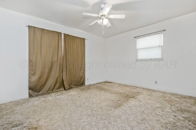 an empty room with a window