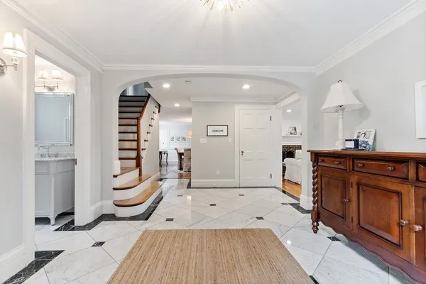 a spacious bathroom with a bathtub and a sink