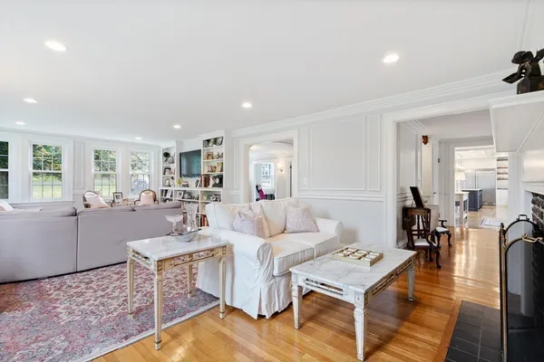 a living room with furniture and a table
