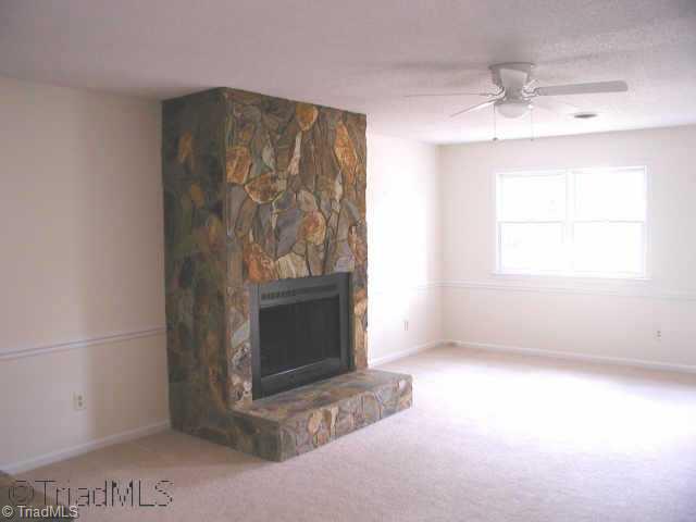 1940 Murrayhill Road Greensboro, NC 27403 - Photo 5 of 5 Other. Large living room with beautiful Rock Fireplace