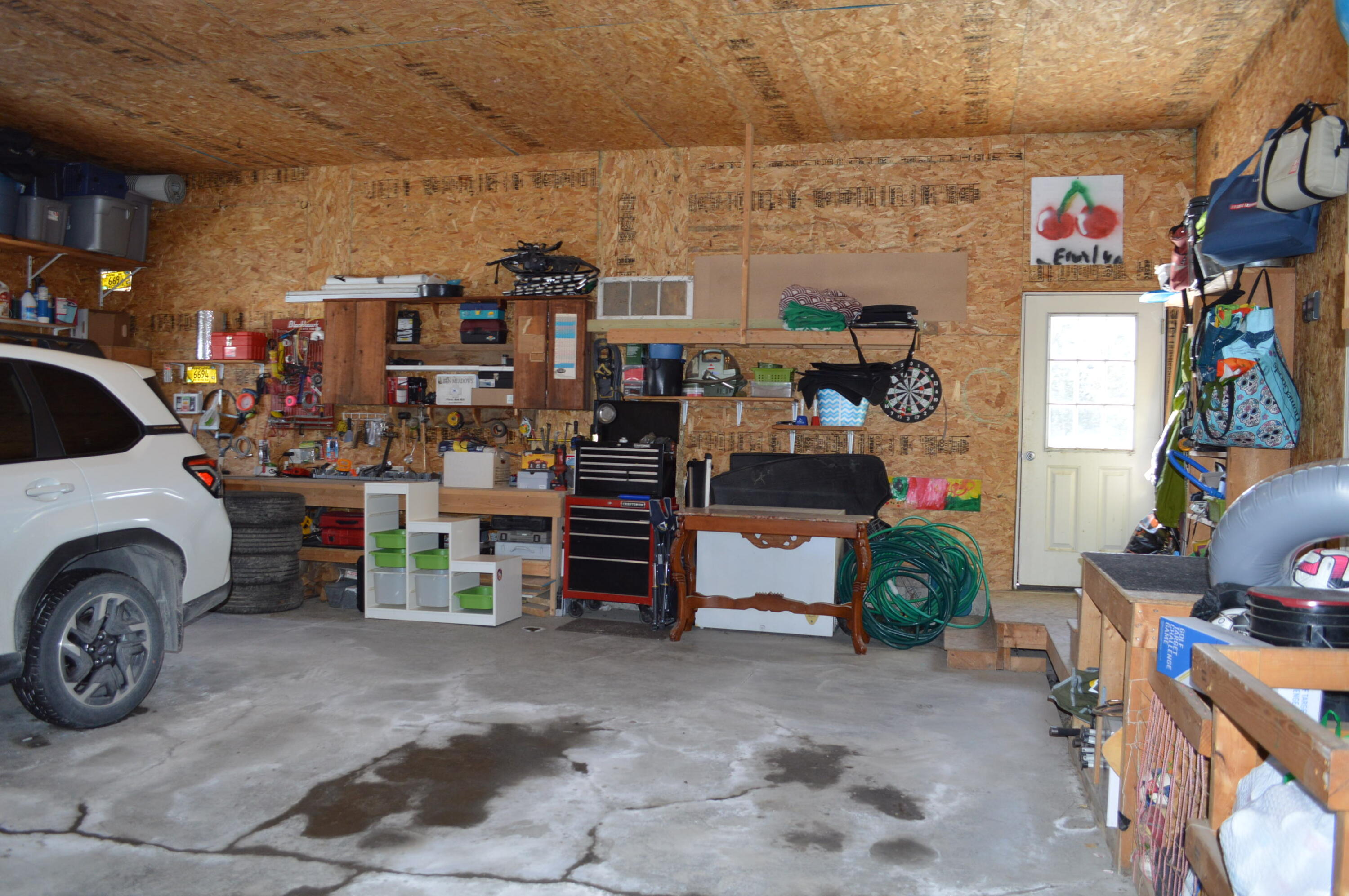 305 Market Street Fort Kent, ME 04743 - Photo 48 of 58 garage with access to fenced-in backyard