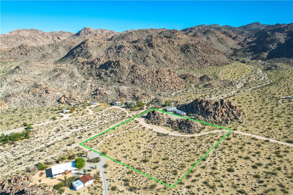 66425 Serrano Road Joshua Tree, CA 92252 - Photo 1 of 1 a view of a backyard of a house