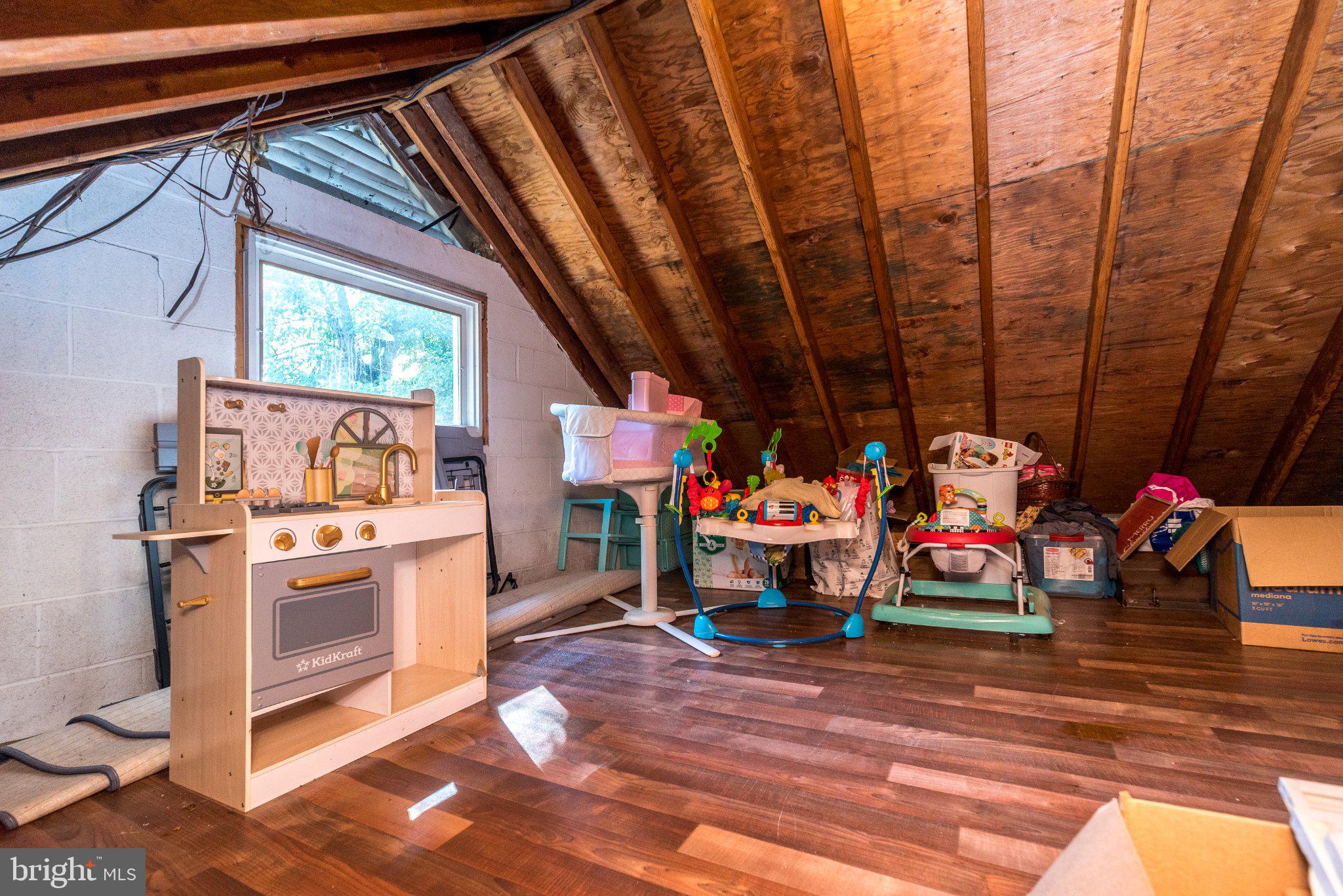 109 Ridge Street Reading, PA 19607 - Photo 34 of 41 Cozy attic space with playful charm.