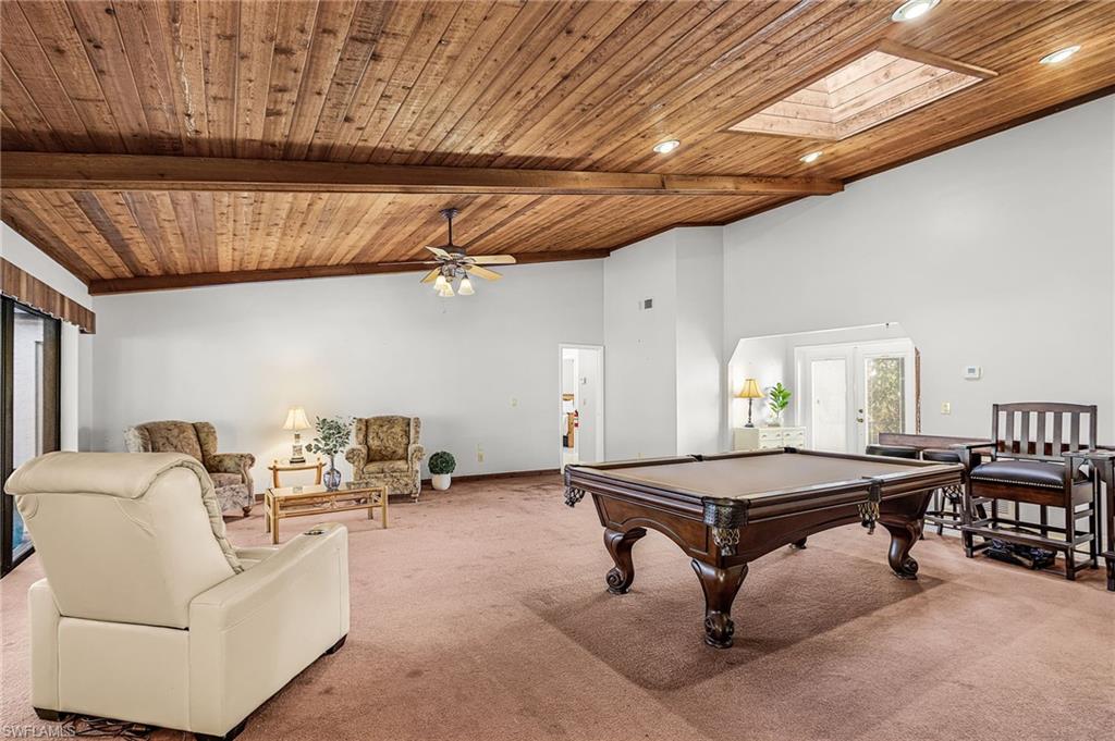 403 Southwest 34th Street Cape Coral, FL 33914 - Photo 15 of 32 Rec room with a wooden ceiling with exposed beams, pool table, high vaulted ceiling, french doors, and carpet floors