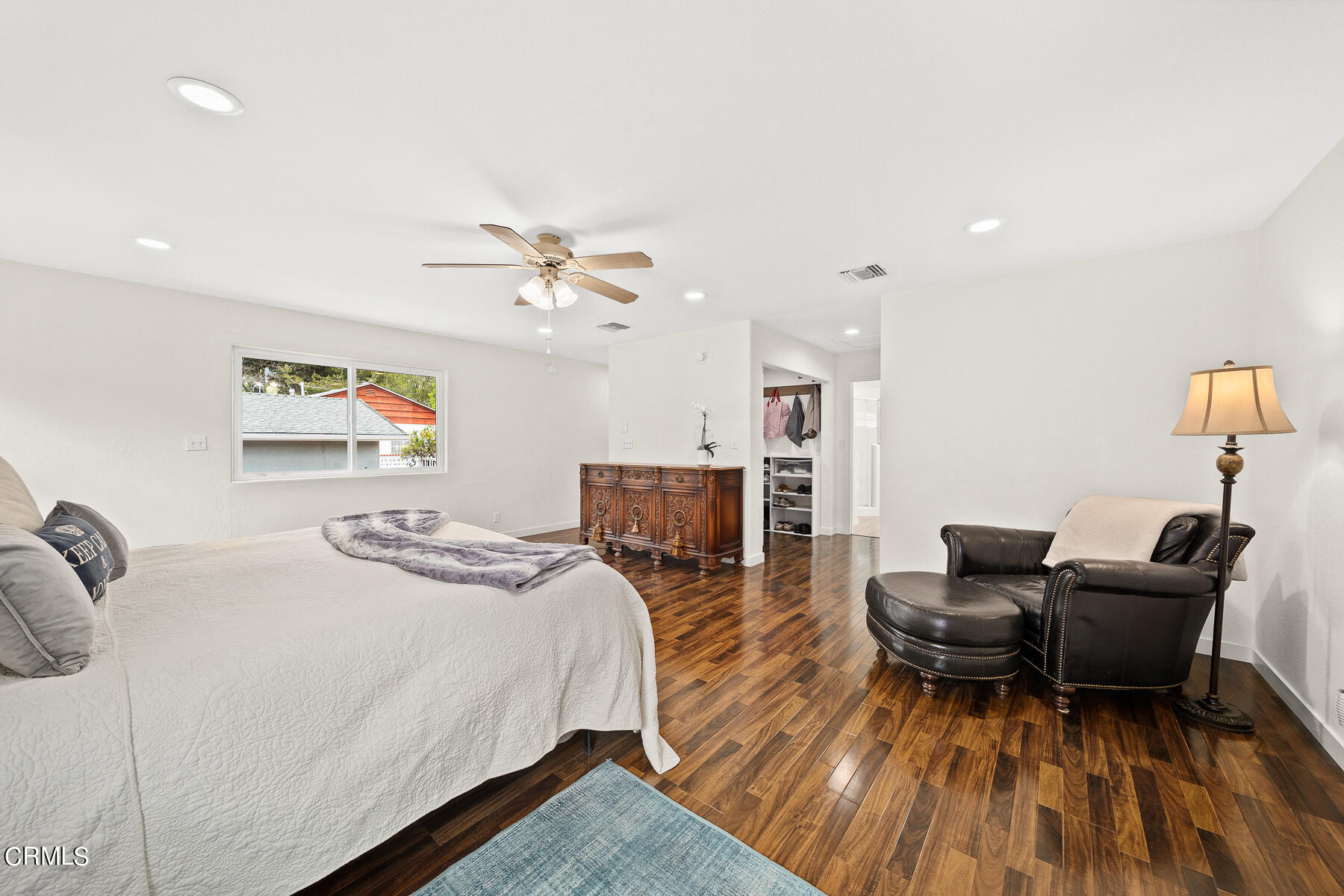9765 Tujunga Canyon Boulevard Tujunga, CA 91042 - Photo 20 of 51 a bedroom with furniture and a wooden floor