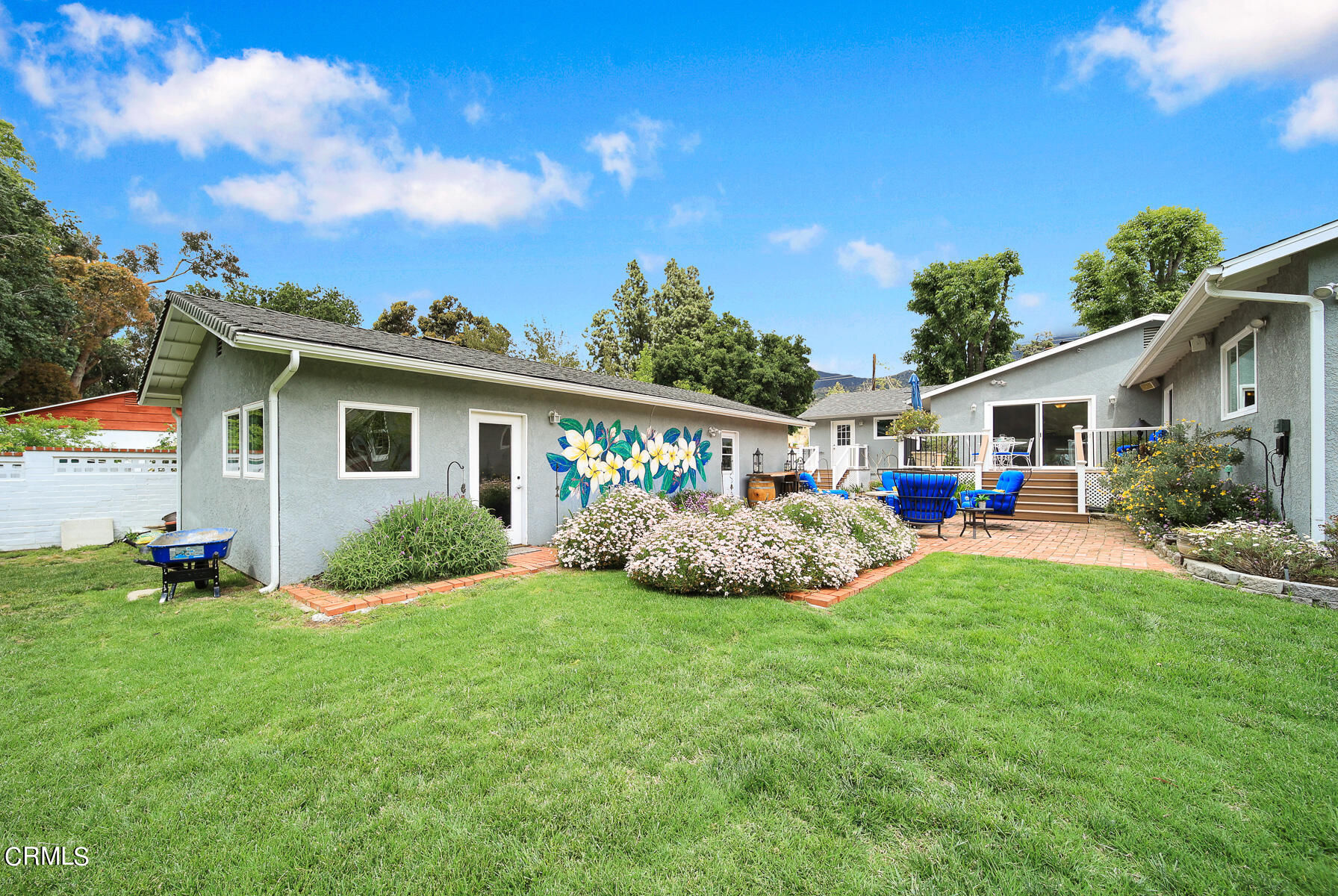 9765 Tujunga Canyon Boulevard Tujunga, CA 91042 - Photo 28 of 51 a view of a house with a yard porch and sitting area