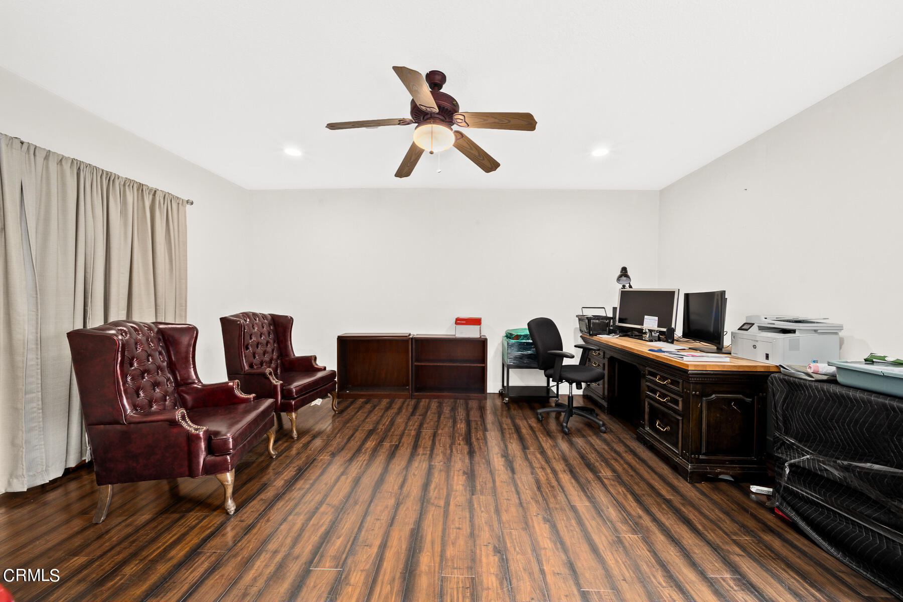 9765 Tujunga Canyon Boulevard Tujunga, CA 91042 - Photo 33 of 51 a living room with furniture and a wooden floor