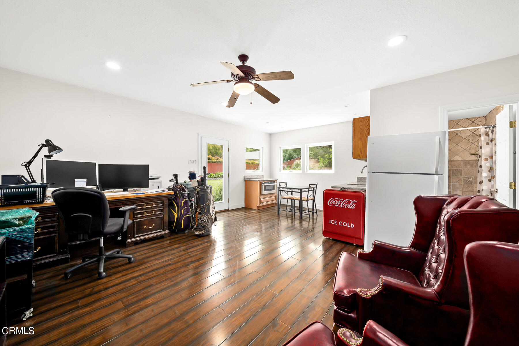 9765 Tujunga Canyon Boulevard Tujunga, CA 91042 - Photo 34 of 51 a living room with furniture and a wooden floor