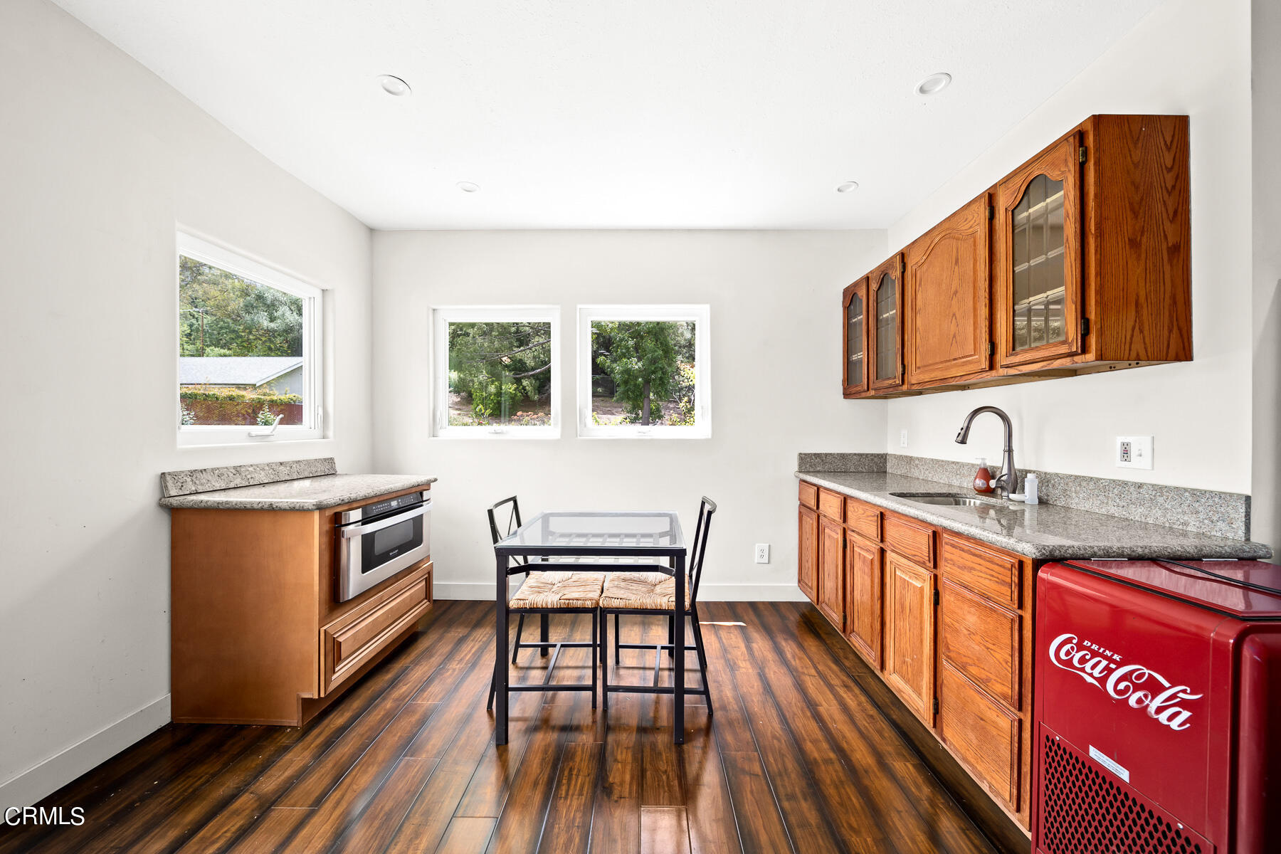 9765 Tujunga Canyon Boulevard Tujunga, CA 91042 - Photo 35 of 51 a hallway with a sink and a stove top oven