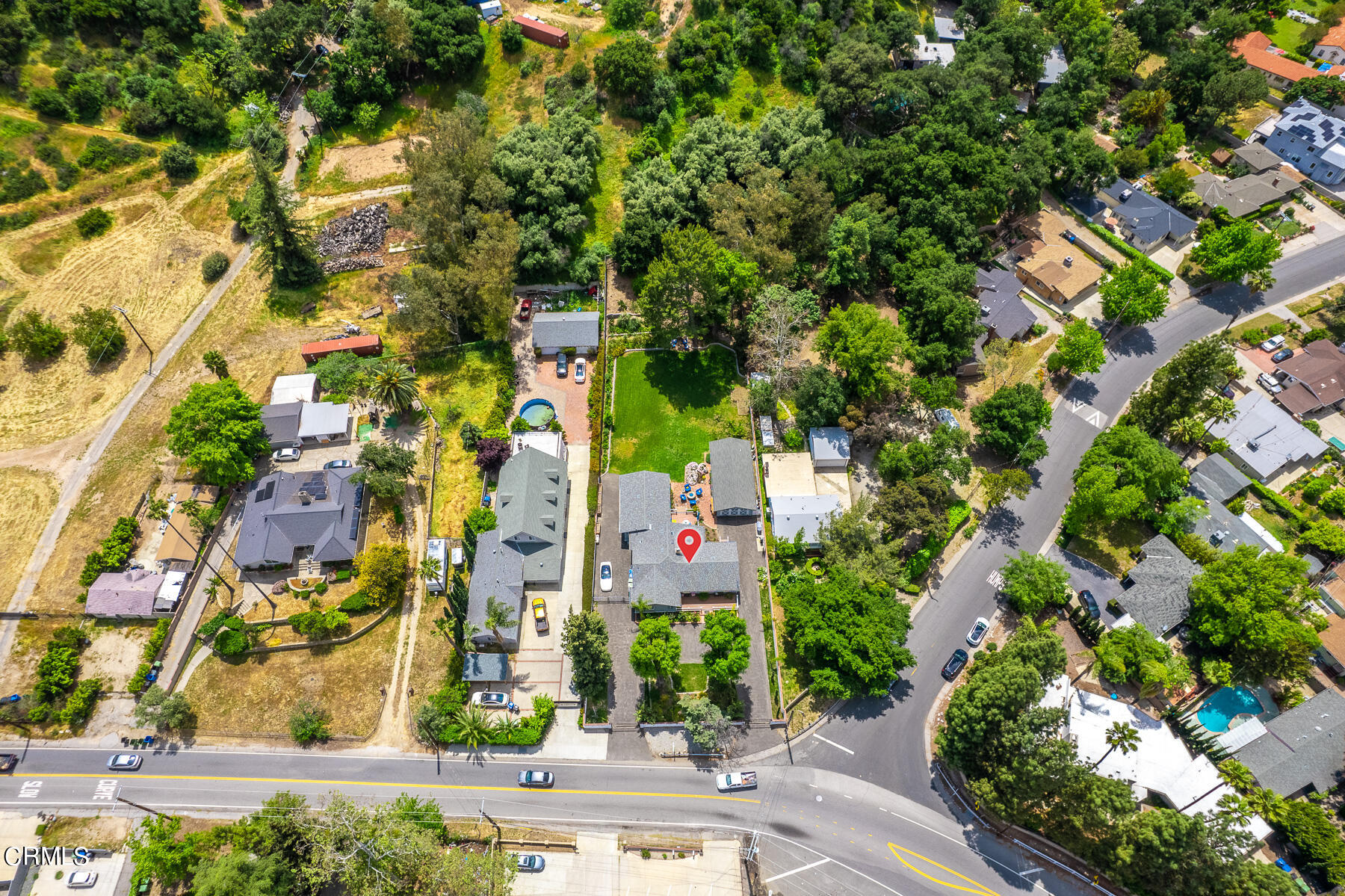 9765 Tujunga Canyon Boulevard Tujunga, CA 91042 - Photo 43 of 51 an aerial view of multi story residential apartment building with yard