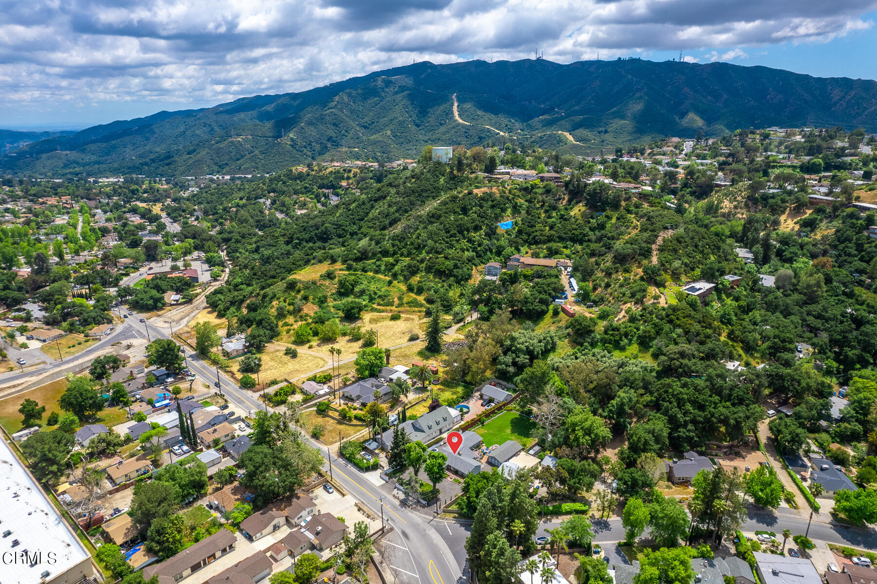 9765 Tujunga Canyon Boulevard Tujunga, CA 91042 - Photo 44 of 51 a view of a city with green field