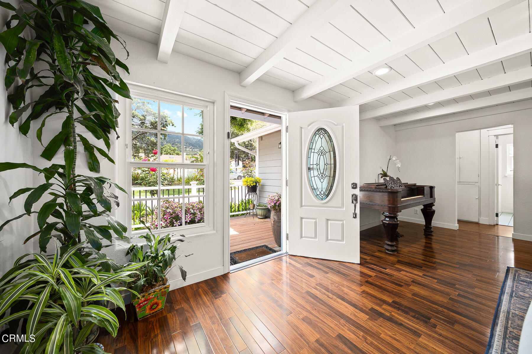 9765 Tujunga Canyon Boulevard Tujunga, CA 91042 - Photo 7 of 51 a living room with furniture and a potted plant