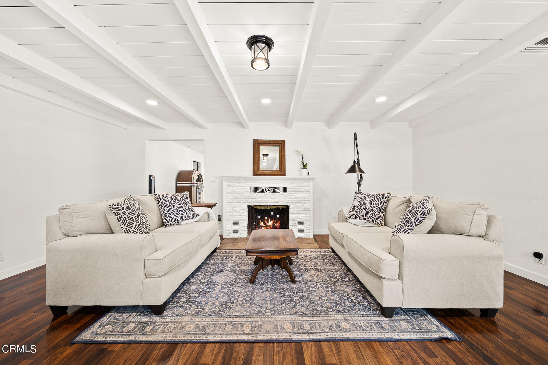 9765 Tujunga Canyon Boulevard Tujunga, CA 91042 - Photo 8 of 51 a living room with furniture and a fireplace