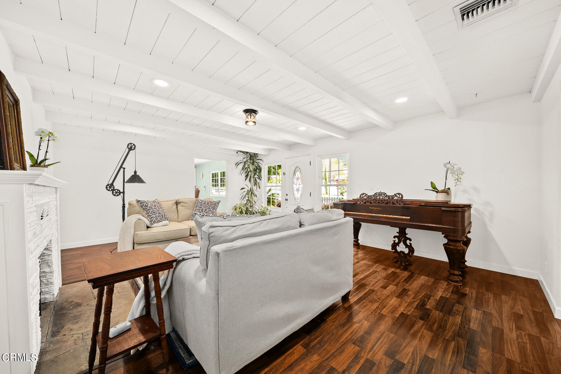 9765 Tujunga Canyon Boulevard Tujunga, CA 91042 - Photo 9 of 51 a living room with furniture and a wooden floor