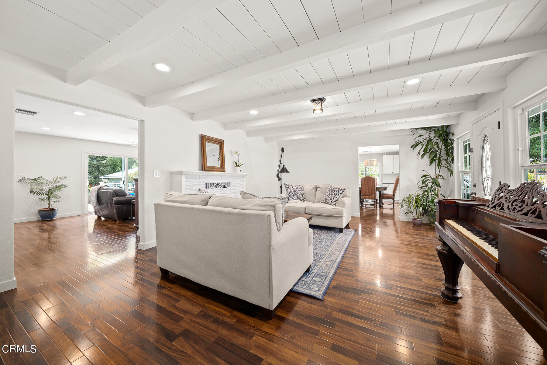 9765 Tujunga Canyon Boulevard Tujunga, CA 91042 - Photo 10 of 51 a living room with furniture and a wooden floor
