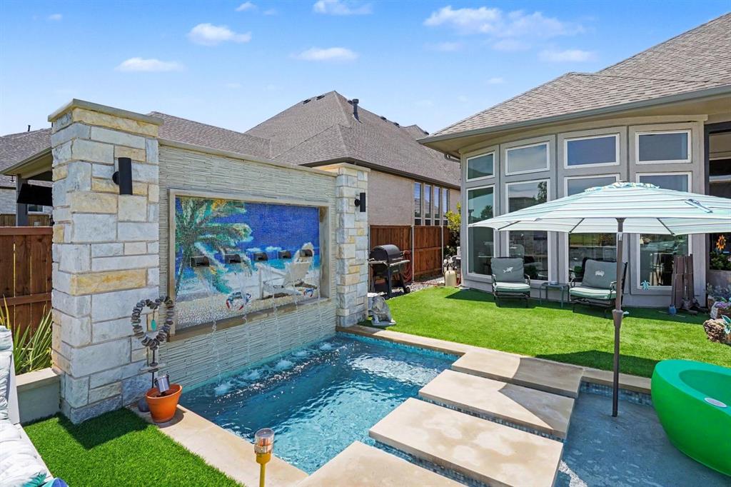 573 Broadleaf Way Haslet, TX 76052 - Photo 5 of 35 a front view of a house with garden