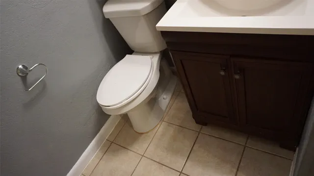 a close view of a toilet in bathroom