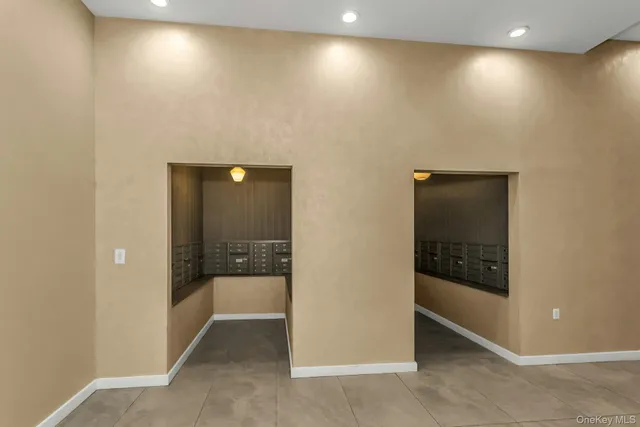 a view of parking garage with cars