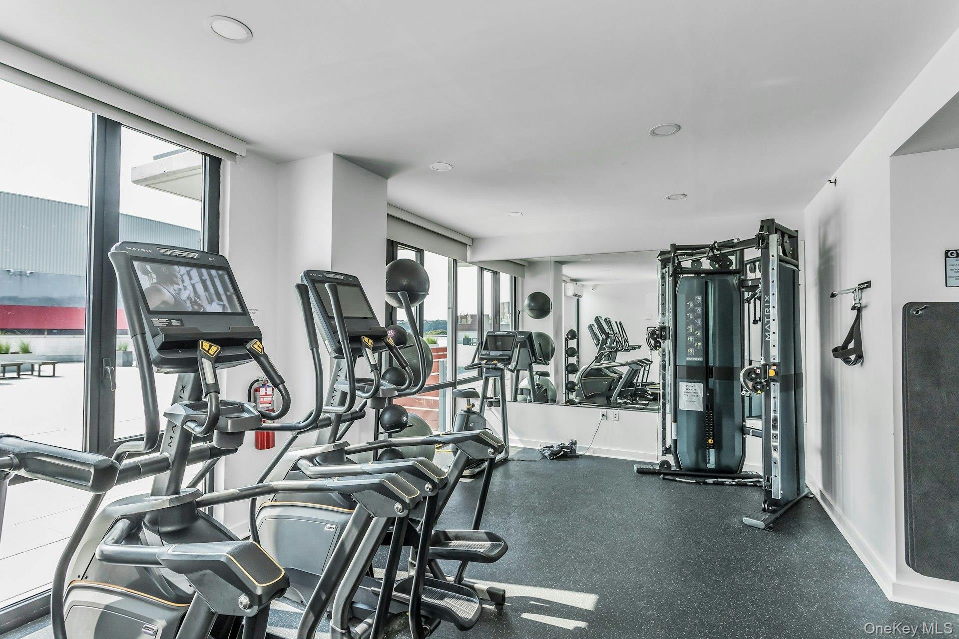 88-08 Justice Avenue, Unit 15N Queens, NY 11373 - Photo 18 of 20 a view of a room with gym equipment