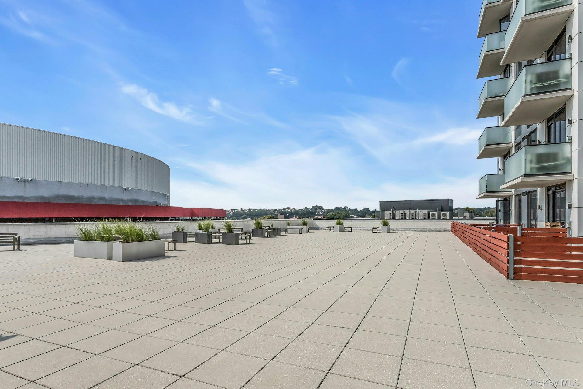 88-08 Justice Avenue, Unit 15N Queens, NY 11373 - Photo 19 of 20 a view of a terrace with