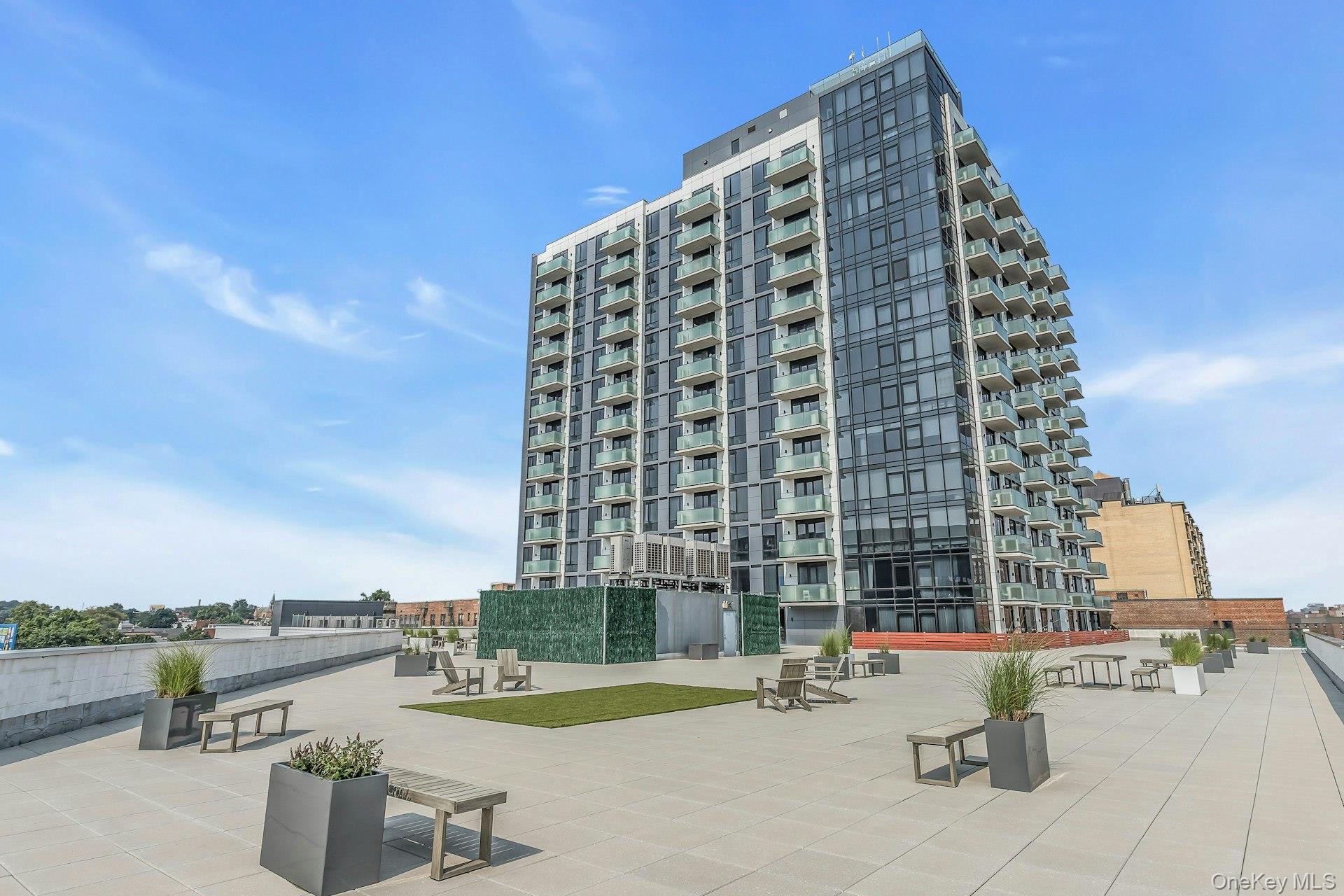 88-08 Justice Avenue, Unit 15N Queens, NY 11373 - Photo 20 of 20 a view of terrace with seating space and city view