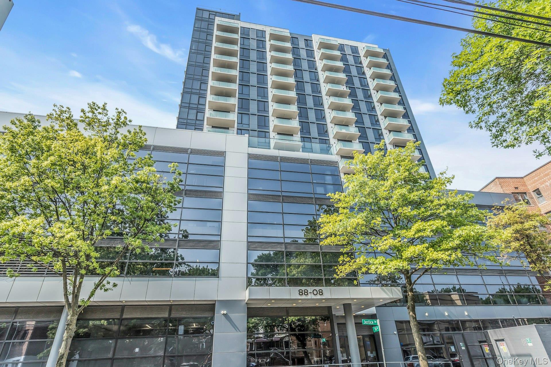 88-08 Justice Avenue, Unit 15N Queens, NY 11373 - Photo 2 of 20 front view of a building