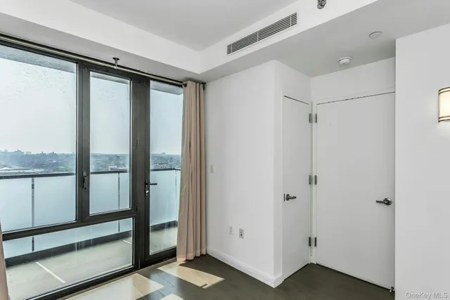 a view of a bathroom with a glass door