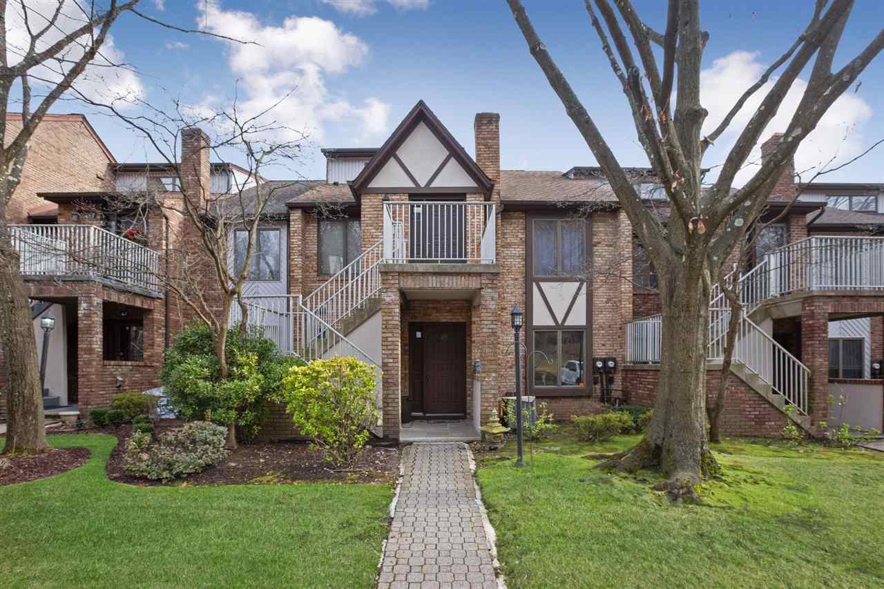 900 Valley Road, Unit A005 Clifton, NJ 07013 - Photo 1 of 1 a front view of a house with garden