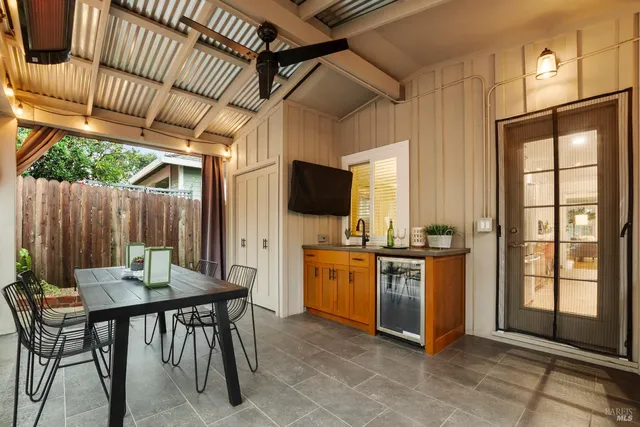 a outdoor dining space with furniture