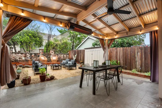 a view of yard with patio