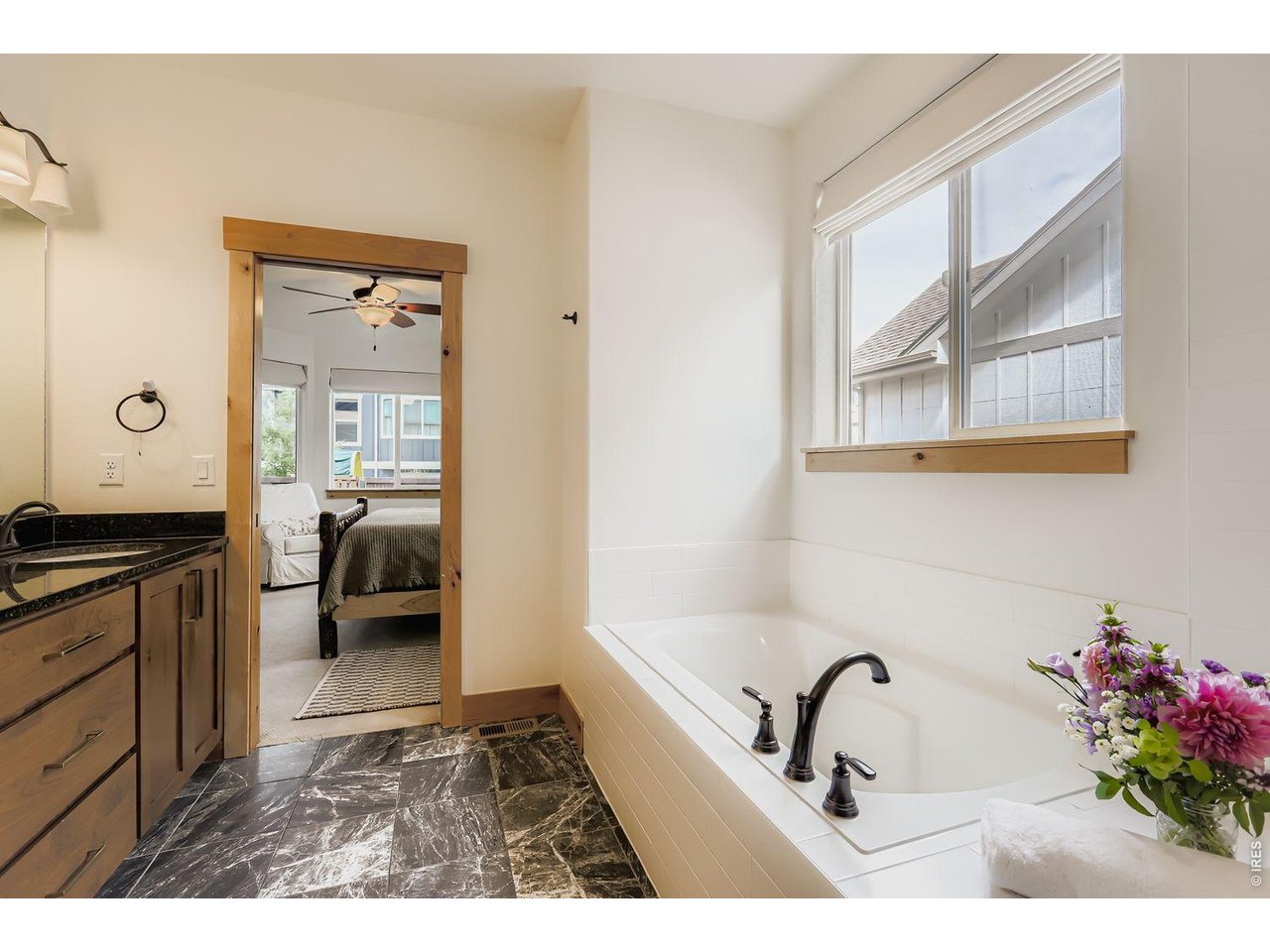 2012 Day Spring Drive Windsor, CO 80550 - Photo 14 of 31 Unwind in this sunlit soaking tub.