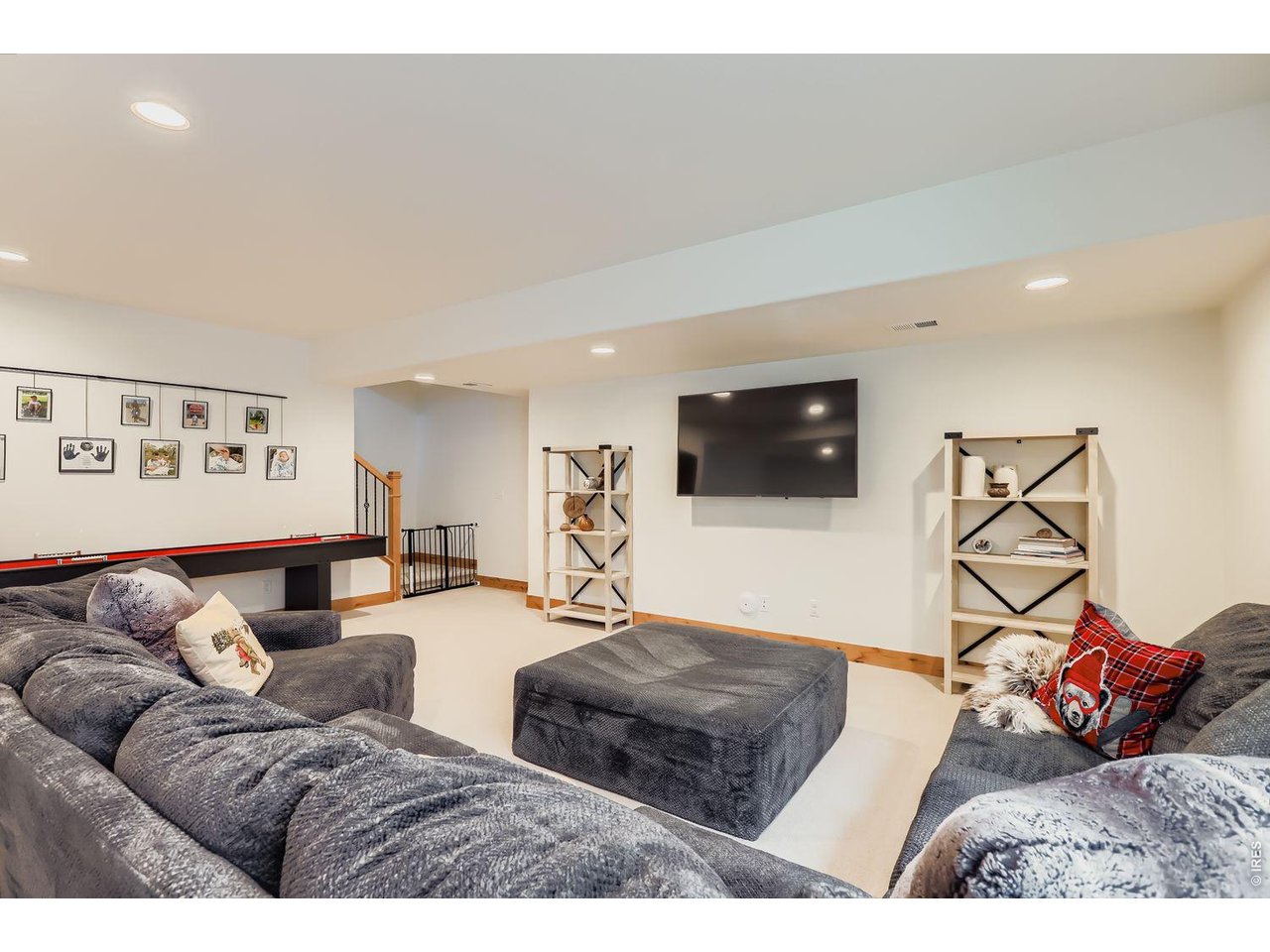 2012 Day Spring Drive Windsor, CO 80550 - Photo 24 of 31 Cozy up for movie nights or game day in this spacious, stylish lower-level retreat