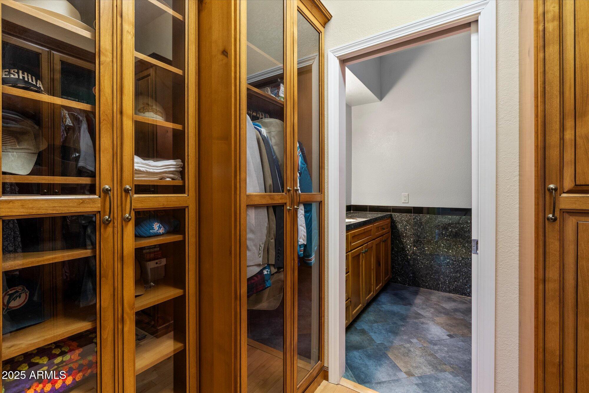 7272 East Gainey Ranch Road, Unit 104 Scottsdale, AZ 85258 - Photo 24 of 45 a view of walk in closet