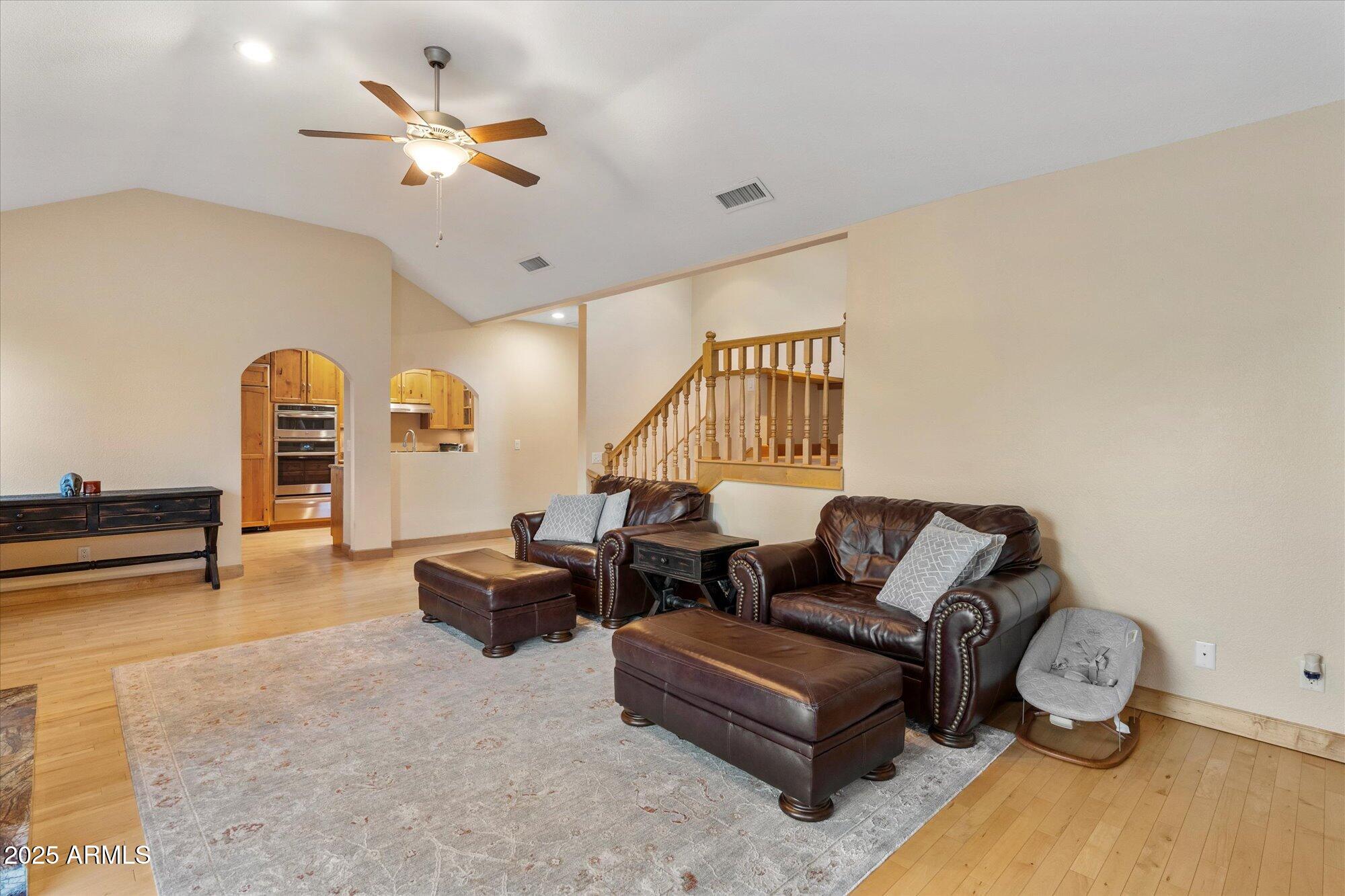 7272 East Gainey Ranch Road, Unit 104 Scottsdale, AZ 85258 - Photo 9 of 45 a living room with furniture