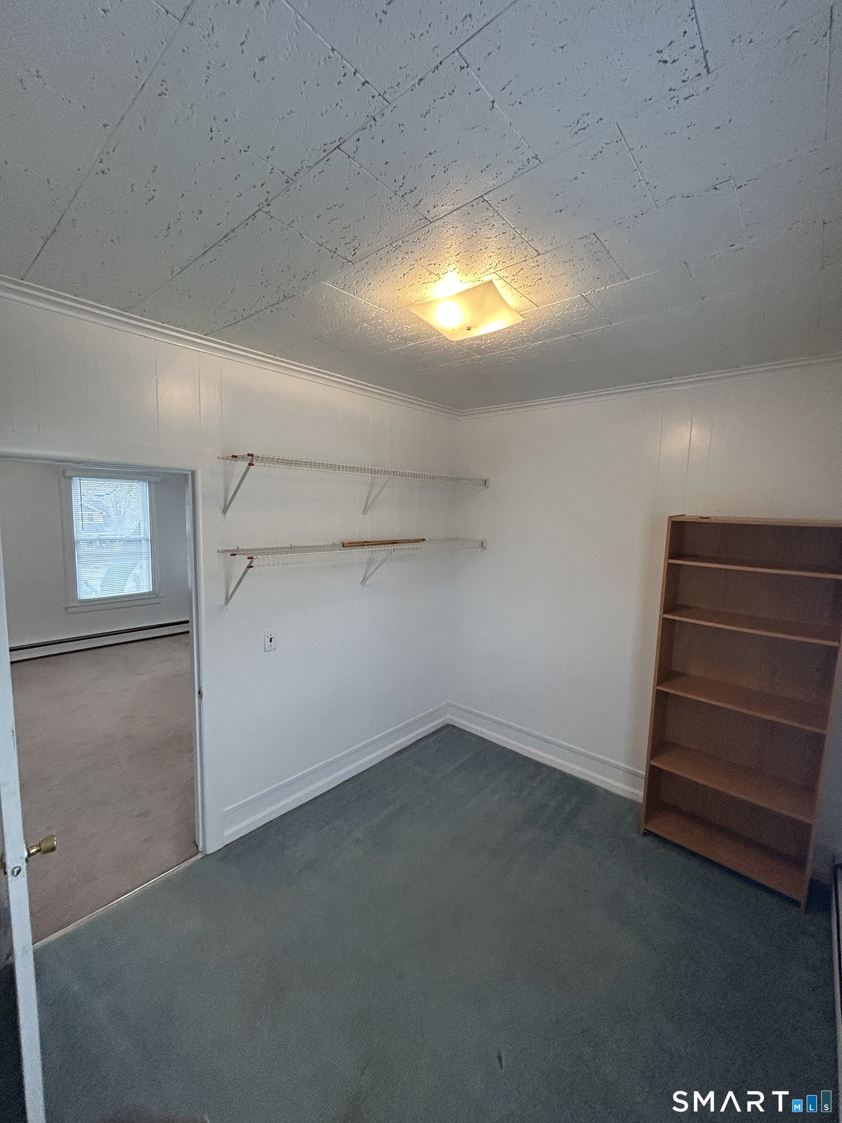 73 Peck Street, Unit 2 Norwich, CT 06360 - Photo 18 of 21 a view of an empty room with a window