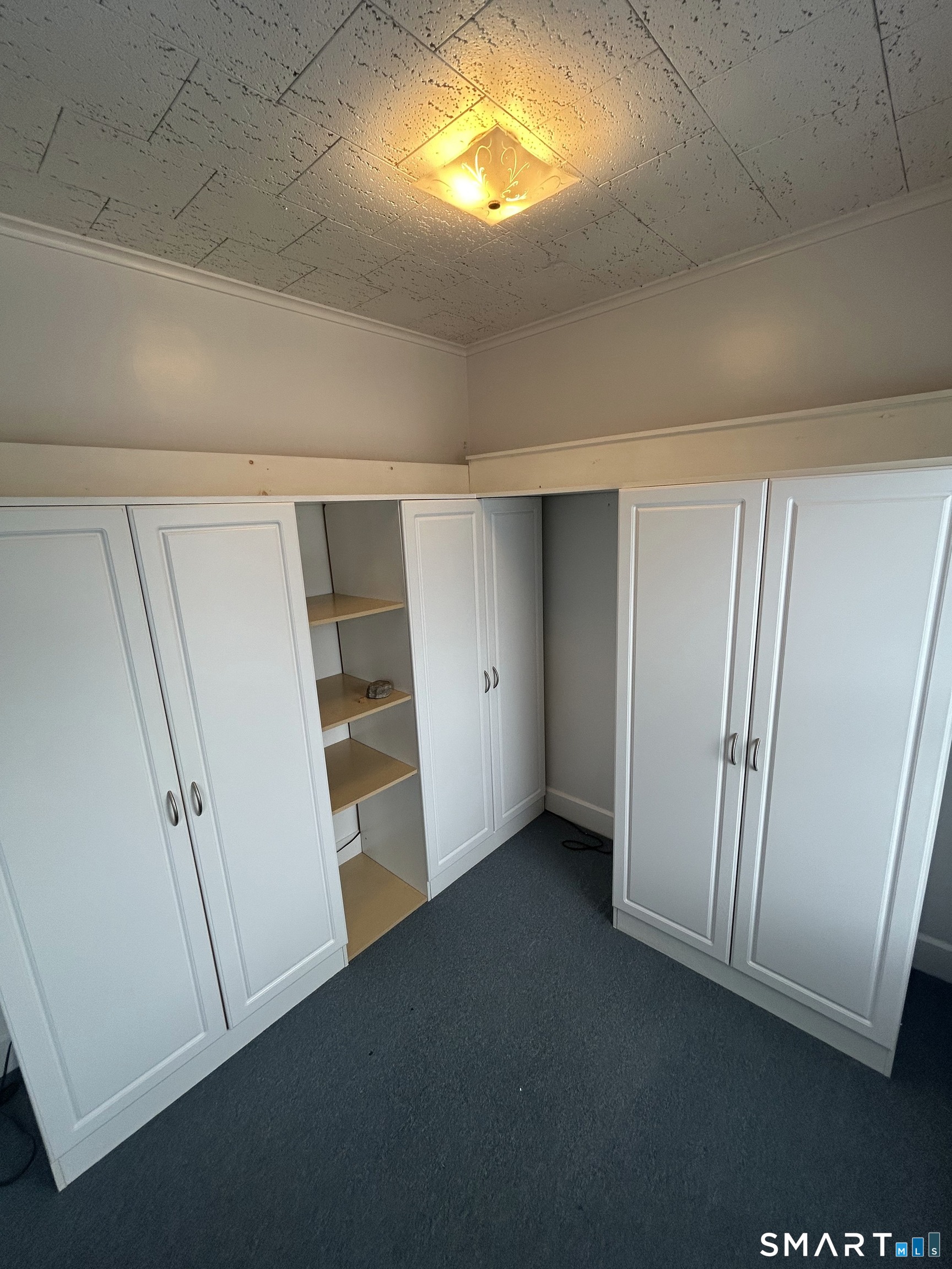 73 Peck Street, Unit 2 Norwich, CT 06360 - Photo 10 of 21 an empty room with closet