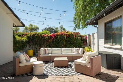 a outdoor living space with furniture and garden view