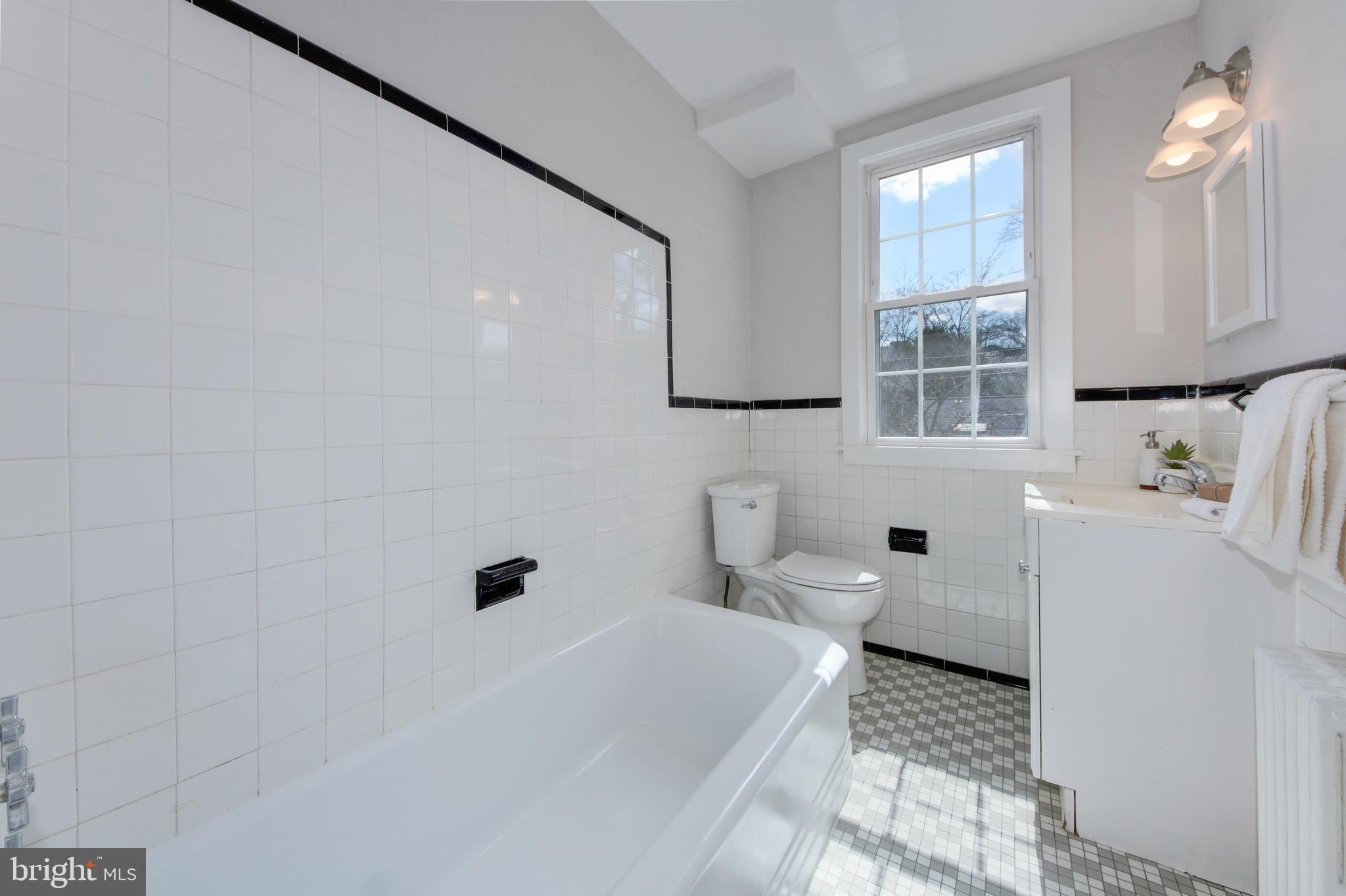 2716 Ordway Street Northwest, Unit 2 Washington, DC 20008 - Photo 23 of 50 Main level hall bathroom