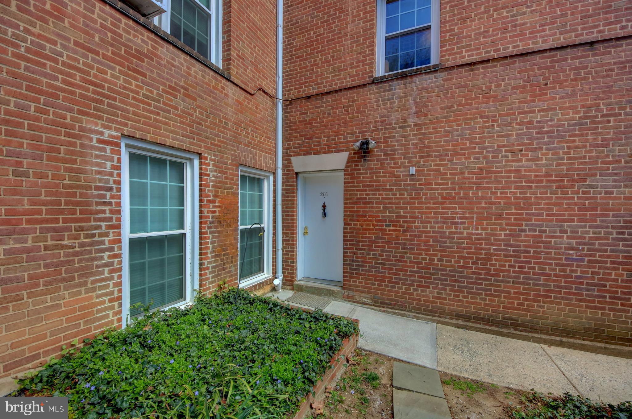 2716 Ordway Street Northwest, Unit 2 Washington, DC 20008 - Photo 26 of 50 Second entrance leads right to parking spot