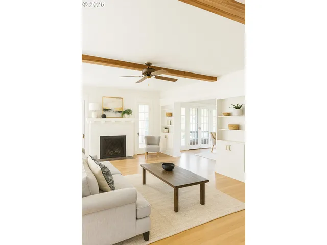 a living room with furniture and a table