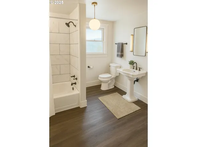 a kitchen with stainless steel appliances a refrigerator sink and cabinets