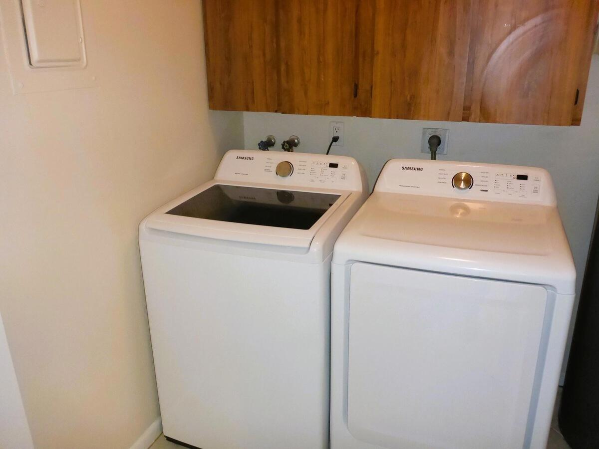 431 Jupiter Lakes Boulevard, Unit 2109A Jupiter, FL 33458 - Photo 23 of 23 a utility room with dryer and washer