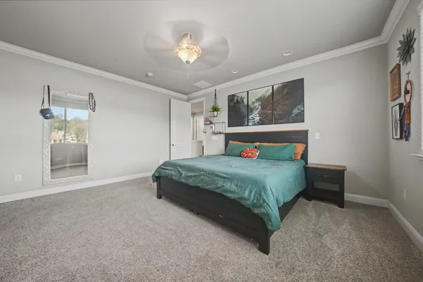 a white bath tub sitting next to a window