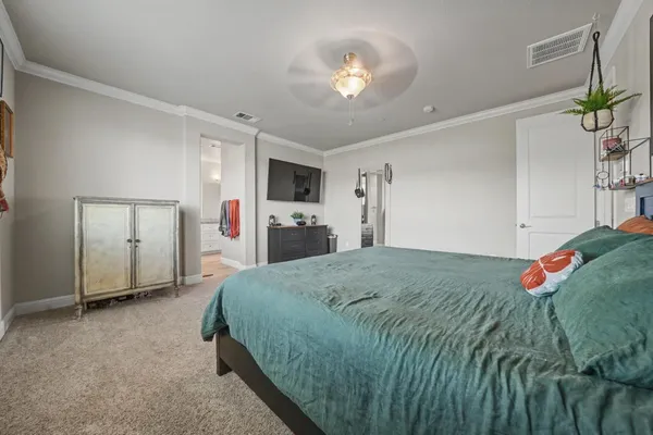 a bathroom with a granite countertop sink mirror and a bathtub