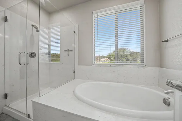 a view of a yard with patio