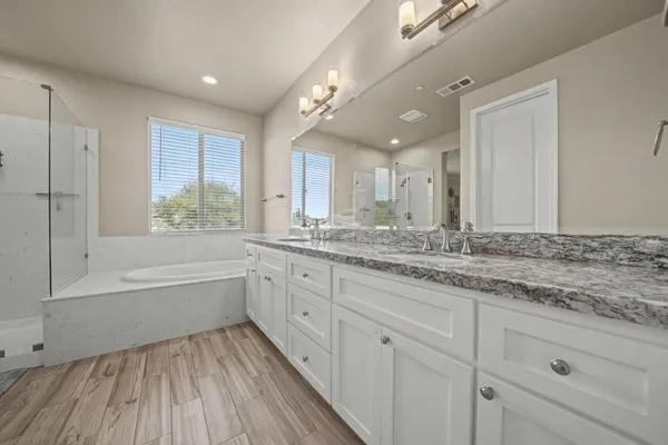 a view of a swimming pool with a patio