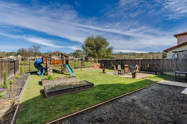 an aerial view of a city with ocean view